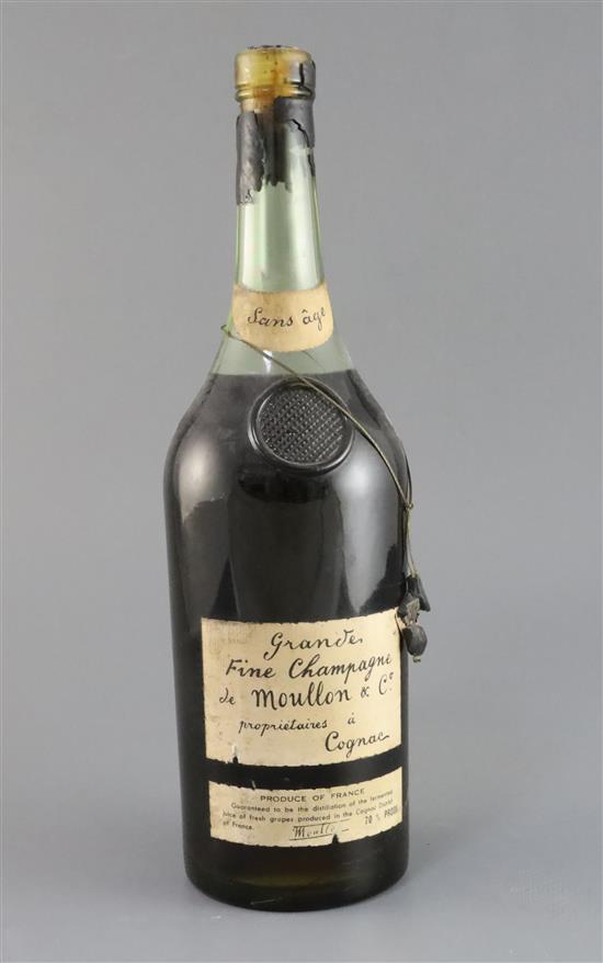 A large bottle of De Moullon & Co Grand fine champagne cognac 14.25in.